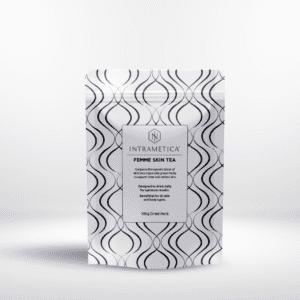 A package of intrametica femme skin tea, featuring a white and black curvy line design, labeled for daily use with 100g of dried herb.