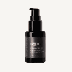 A black skincare serum bottle with a pump dispenser, labeled "re veal 13% aha / 2% bha serum to exfoliate and refine skin texture, 30 ml" against a white background.
