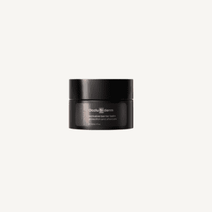 A black container of oculus derm protective barrier balm on a white background. the label displays the product name and description in white text.