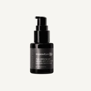 A black pump dispenser bottle labeled "improeyes day" by synergie skin, described as an age-defying eye serum with advanced peptide technology, isolated on a white background.