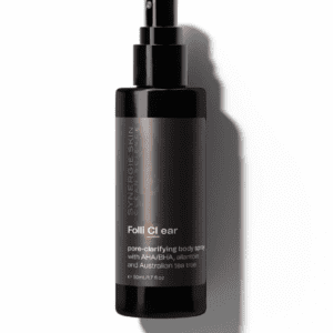 Black bottle with a spray nozzle, labeled as 'follí clear' pore-clarifying body spray containing aha/bha, allantoin, and australian tea tree oil, isolated on a white background with a soft shadow.