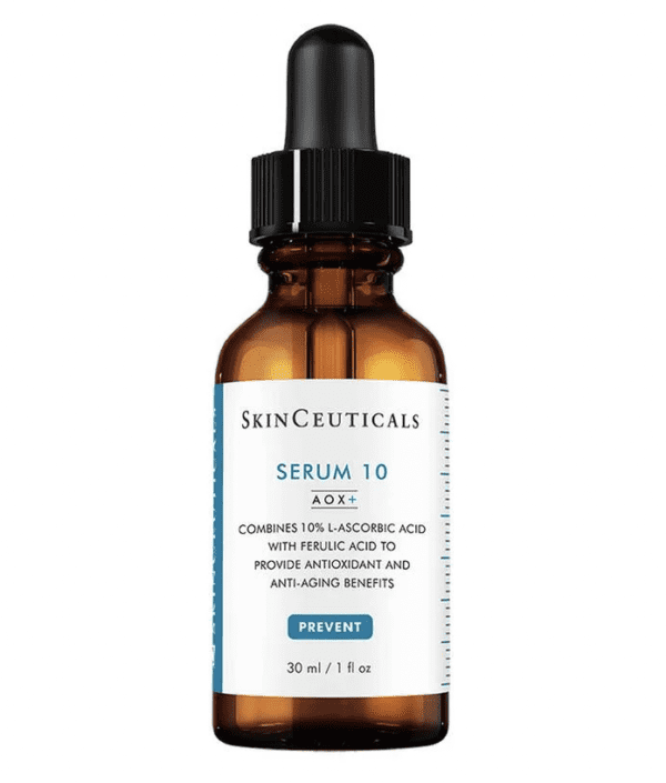 A bottle of skinceuticals serum 10 aox+ with a dropper, labeled for its anti-aging and antioxidant properties, containing 10% l-ascorbic acid. the bottle is clear, showing the light yellow serum.
