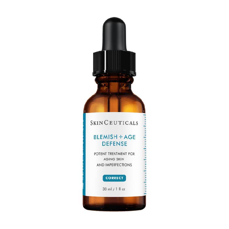 A bottle of skinceuticals blemish + age defense serum with a dropper cap, labeled as a potent treatment for aging skin and imperfections. the container holds 30 ml or 1 fl oz of the product.