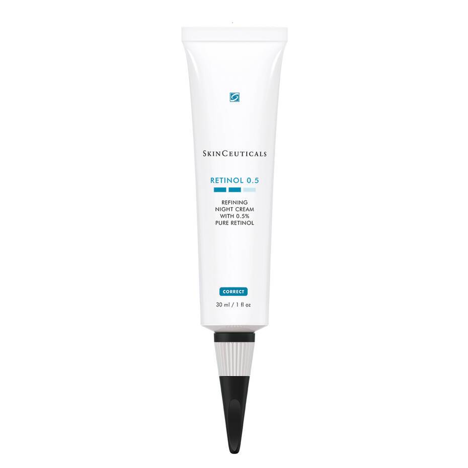 A white tube of skinceuticals retinol 0.5 refining night cream with a black cap, labeled for anti-aging and skin correction, containing 30 ml of product.
