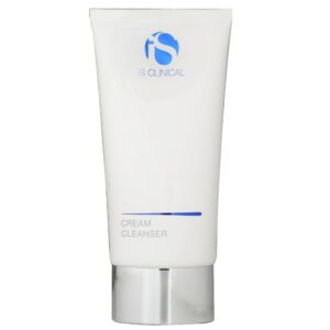 A 120ml tube of iS Clinical Cream Cleanser comes in white with a silver cap, displaying the blue logo and product name on the front.